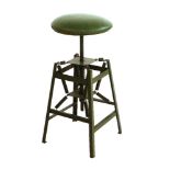 A draughtsman's stool, designed by Charles E Miller for American Cabinet Co., painted green with