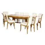 A maple dining table,with four extra leaves, with a glass central panel,206cm extended107cm wide75cm