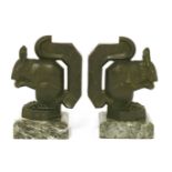 A pair of cast squirrel bookends,designed by Max Le Verrier, on marble plinths,14.5cm high (2)