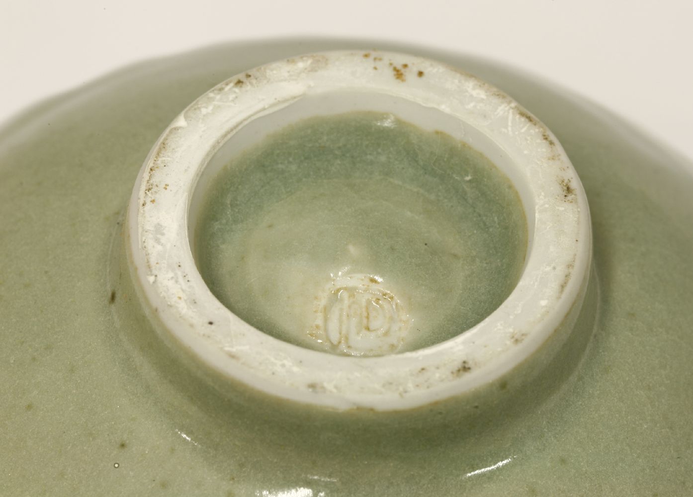 *David Leach (1911-2005), a spiral cut celadon glazed bowl, impressed seal mark, 10cm high - Image 2 of 2