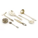 Georg Jensen items,a beaded ladle,a caddy spoon, Continental pattern,a butter knife, ornamental