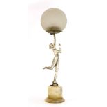An Art Deco spelter and marble table lamp,modelled as a silvered figure holding a lamp,15cm