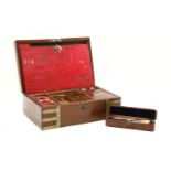 A Victorian mahogany travelling toiletry box, with brass banding and recessed handles, the fitted