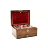 A Victorian rosewood vanity case, with a fitted interior, comprising silver plate top jars and boxes