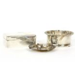 A silver circular ashtray, mounted with a small model of a dog, by Adie Brothers Ltd, Birmingham,