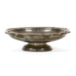 A silver presentation bowl of shallow form, with gadrooned rim on footed base, by Adie Brothers Ltd,