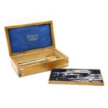 A late 19th century/early 20th century Stanley oak cased drawing set