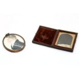 A portrait miniature of a man, oval on paper, inscribed verso 'painted by W.C.? 1824, and an