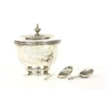 A silver tea caddy by Charles & Richard Comyns, London, 1924, together with two silver tea caddy