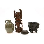 Two Chinese wood carvings, and a vase