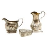 A George III silver cream jug, with chased leaf decoration, together with a Victorian cream jug,