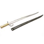 A French Chassepot bayonet and scabbard, inscribed ' Mre D'Armes de Chat Janvier 1872. 71cm long