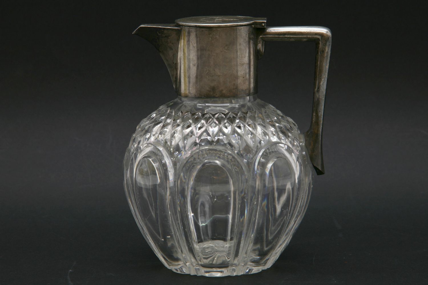 A silver mounted claret jug, by John Grinsell & Son, Birmingham 1890, 17cm high