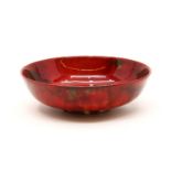 A Royal Doulton flambe bowl, signed 'Noke', 15cm diameter