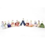 A collection of eleven Royal Doulton figures, Cissie HN1809, Dinky Do HN1678, Rose 1368, Marie