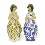 A pair of stoneware skittle figures, designed by Curt Magnus Addin, signed, 30.5cm high (2)