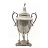 A Continental pewter samover, with looped handles, and 'owl and sandle' feet, 60cm high