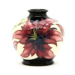 A Moorcroft 'Flower of the Ocean' vase, by Rachel Bishop, numbered 1/30, 10.5cm high, boxed