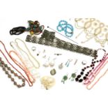 A collection of costume jewellery, a silver plated pierced panel belt, a single row coral bead