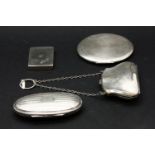 Two silver purses, one modelled as a bag on chain, E J Trevitt & Sons, Chester, 1917, together