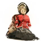 A Victorian wax head doll