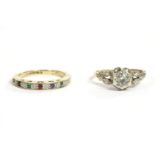 A 9ct gold single stone cubic zirconia ring, illusion set to split shoulders and a plain polished