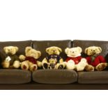 Five Harrods Christmas teddy bears, including 1996, 2000, 2005, 2009, together with a 21st century