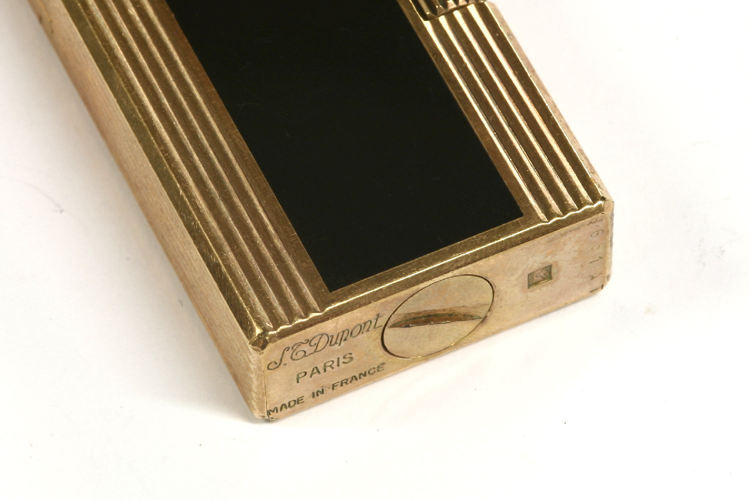 An S T Dupont gold plated lighter, set with Japanese black lacquer inlay, with printed oriental - Image 2 of 2