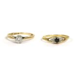 An 18ct gold single stone diamond ring, illusion set to chenier shoulders and plain polished