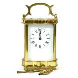 A brass cased carriage clock