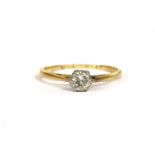 A gold single stone diamond ring, a brilliant cut diamond, claw set to chenier shoulders and a plain