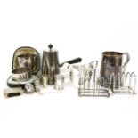 A silver milk jug, a silver toast rack, two bowls, a silver tankard, etc. approximately 30ozt