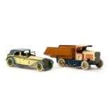 A tin plate clockwork chauffeur driven car, and a tipper truck (2)