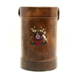 An early 20th century leather fire bucket, with central coat of arms, impressed marks to base,