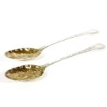 A pair of George III hallmarked silver berry spoons, with gilt bowls, Paul Callard, London 1761,