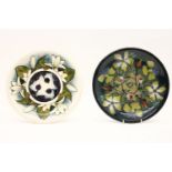 Two Moorcroft dishes, 'Juneberry', a trial dated 22.11.2000, 26.5cm diameter and another, 26cm
