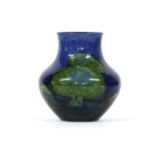 A William Moorcroft Moonlit Blue vase, signed and impressed marks, damage to rim, height 12.5cm