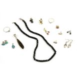 A collection of earrings, to include a 9ct gold diamond wishbone ring, 0.93g, a pair of silver