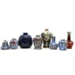 Five Cobridge stoneware vases, largest 17cm high, two lidded Poppy vases, 9.5cm high and a pot and