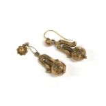 A pair of Victorian gold hollow earrings, with articulated faceted ball drop, (one with fitting