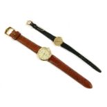 A ladies 9ct gold Omega mechanical Geneve strap watch, and a gentlemen's 9ct gold Accurist gold