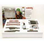 A Märklin HO gauge digital train set, model no 29475, comprising of a locomotive, carriages, tracks,