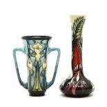 A Moorcroft Calla Lilly loving cup, 15cm high, and a vase, 20cm high, one box