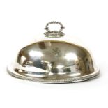 An Elkington silver plated dish cover, crested, with a gadrooned rim, 35cm