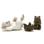 Three Copenhagen bears, two playful bears, and a polar bear cup, rolling on its back, largest 9.