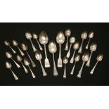 A collection of silver flatware from various periods