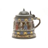 A German saltglazed stoneware tankard,dated 1637, with named apostles to the body, pewter mounted,