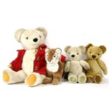 A Merrythought tiger, together with three teddy bears
