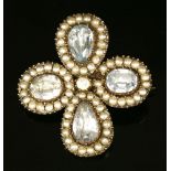 A Georgian gold, foiled topaz and split pearl circular brooch/pendant, two pairs of oval and pear