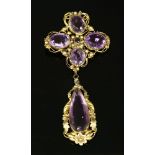 A Regency gold cannetille amethyst brooch with a pendant drop below,a cruciform top section with a